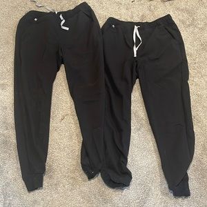 Mens joggers medium.  See bleach stains